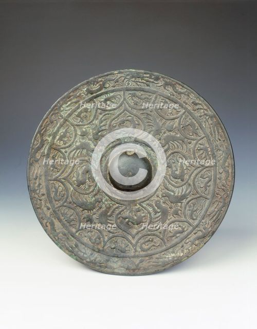 Bronze mirror with dragon and phoenix design, early Six Dynasties period, China, mid 3rd century. Artist: Unknown