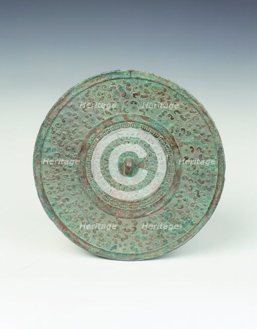 Bronze mirror with dragon heads pattern, Eastern Zhou dynasty, China, 6th-5th dynasty BC. Creator: Unknown.