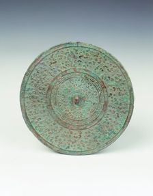 Bronze mirror with dragon heads pattern, Eastern Zhou dynasty, China, 6th-5th dynasty BC. Creator: Unknown