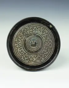Bronze mirror with kui dragon pattern, Western Han dynasty, China, 2nd century BC. Creator: Unknown