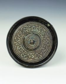 Bronze mirror with kui dragon pattern, Western Han dynasty, China, 2nd century BC. Creator: Unknown