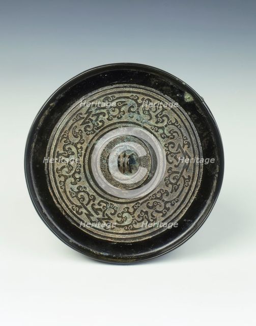 Bronze mirror with kui dragon pattern, Western Han dynasty, China, 2nd century BC. Creator: Unknown.