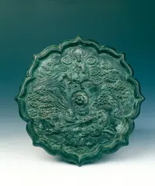 Bronze mirror showing two fighting horsemen, China, 1180-1279. Creator: Unknown