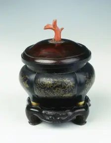 Bronze and marbled metal tripod incense burner, Qing dynasty, China, late 17th-early 18th century. Creator: Unknown