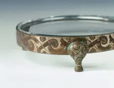 Bronze binding for vessel, with silver inlays, Eastern Zhou dynasty, China, c3rd century BC. Creator: Unknown