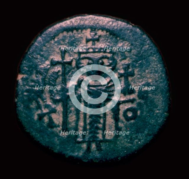 Bronze fals showing a figure holding a cross, 7th century. Artist: Unknown