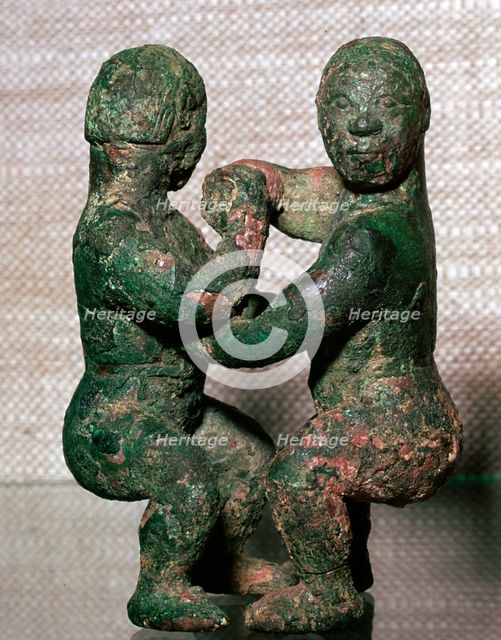 Bronze figures of two wrestlers, Eastern Zhou Dynasty, China, c5th-4th Century BC. Artist: Unknown