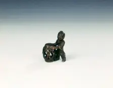 Bronze group of boy with openwork barrel garden seat, Late Ming dynasty, China, 1550-1644. Creator: Unknown