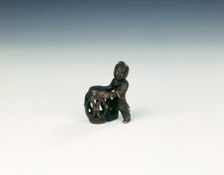 Bronze group of boy with openwork barrel garden seat, Late Ming dynasty, China, 1550-1644
