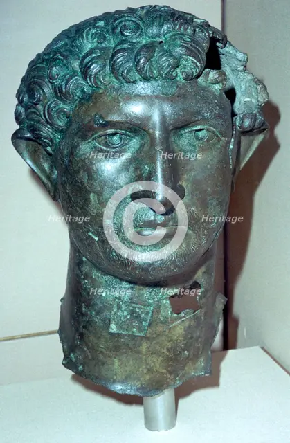 Bronze head from a statue of the Roman Emperor Hadrian, Roman Britain, 2nd century. Artist: Unknown