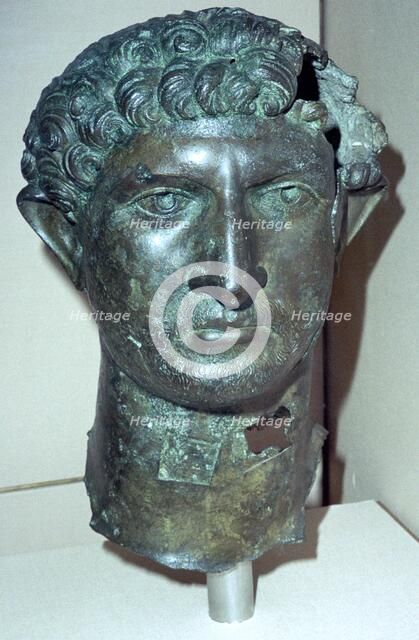 Bronze head from a statue of the Roman Emperor Hadrian, Roman Britain, 2nd century. Artist: Unknown
