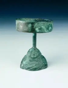 Bronze lamp, the stand in the shape of a warrior's torso, Qin dynasty, China, late 3rd century BC. Creator: Unknown