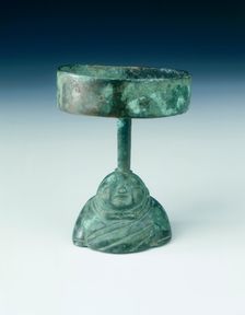 Bronze lamp, the stand in the shape of a warrior's torso, Qin dynasty, China, late 3rd century BC. Creator: Unknown