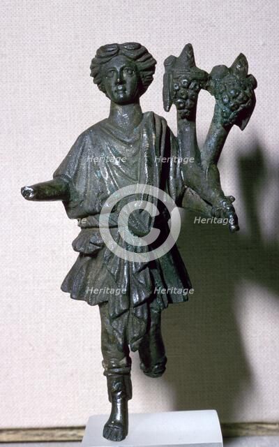 Bronze lar holding a double cornucopia. Artist: Unknown