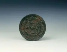 Bronze lion and grapevine mirror, Tang dynasty, China, 618-907 AD. Creator: Unknown