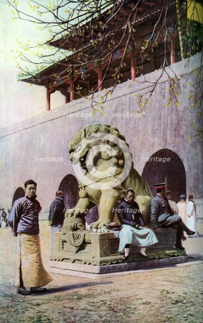 Bronze lion, entrance to the Imperial Palace, Peking, China, c1930s. Artist: Underwood