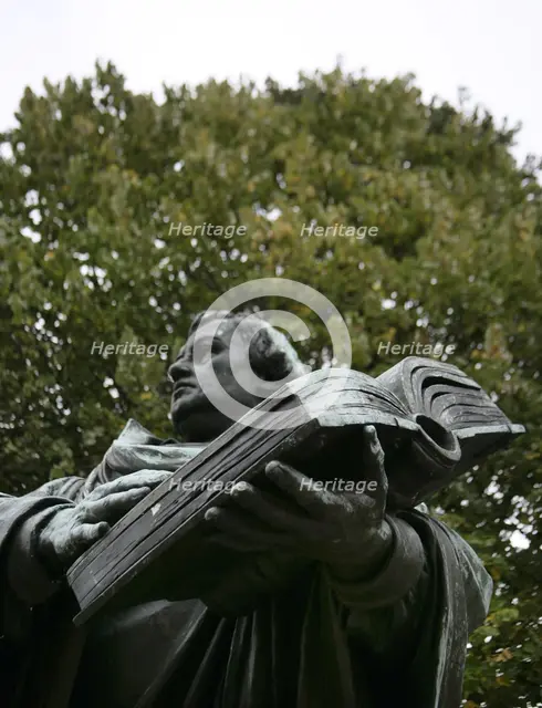 Bronze statue of Martin Luther next to the Marienkirche, (St Mary's Church), Berlin, Germany, 2025.  Creator: LTL.