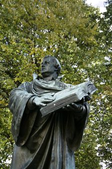 Bronze statue of Martin Luther next to the Marienkirche, (St Mary's Church), Berlin, Germany, 2025. Creator: LTL