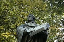 Bronze statue of Martin Luther next to the Marienkirche, (St Mary's Church), Berlin, Germany, 2025. Creator: LTL