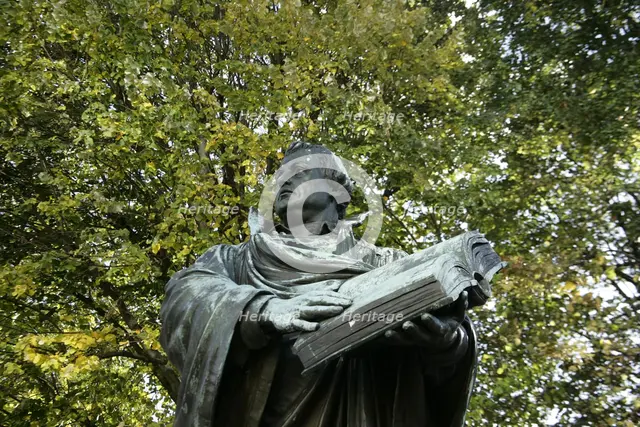 Bronze statue of Martin Luther next to the Marienkirche, (St Mary's Church), Berlin, Germany, 2025.  Creator: LTL.