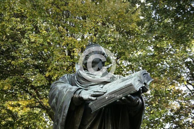 Bronze statue of Martin Luther next to the Marienkirche, (St Mary's Church), Berlin, Germany, 2025.  Creator: LTL.