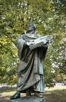 Bronze statue of Martin Luther next to the Marienkirche, (St Mary's Church), Berlin, Germany, 2025. Creator: LTL