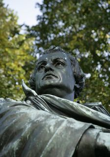 Bronze statue of Martin Luther next to the Marienkirche, (St Mary's Church), Berlin, Germany, 2025. Creator: LTL