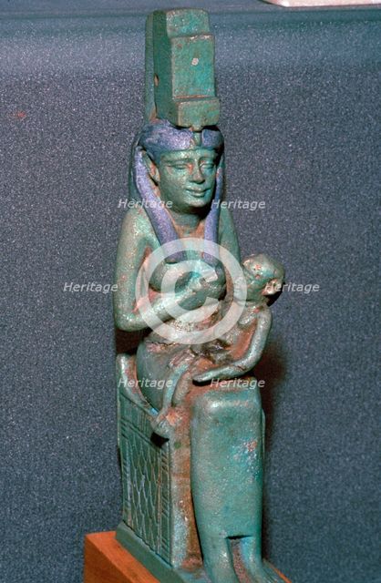 Bronze statuette of the Egyptian goddess Isis suckling Horus. Artist: Unknown