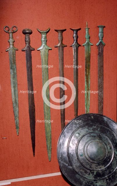 Bronze Swords and Shield from Bavaria. South Germany, 12th-8th century BC. Artist: Unknown.
