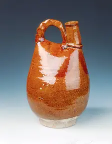 Brown glazed bottle of leather bag shape, Liao dynasty, China, 11th century. Creator: Unknown