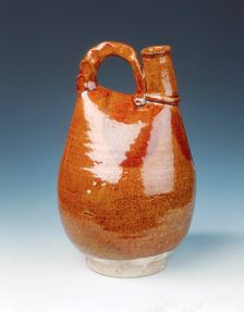 Brown glazed bottle of leather bag shape, Liao dynasty, China, 11th century. Creator: Unknown