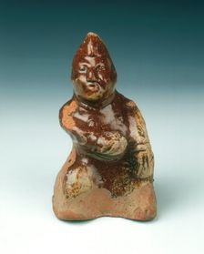 Brown lead glaze pottery dwarf, Eastern Han/Western Jin dynasty, China, 2nd-3rd century. Creator: Unknown