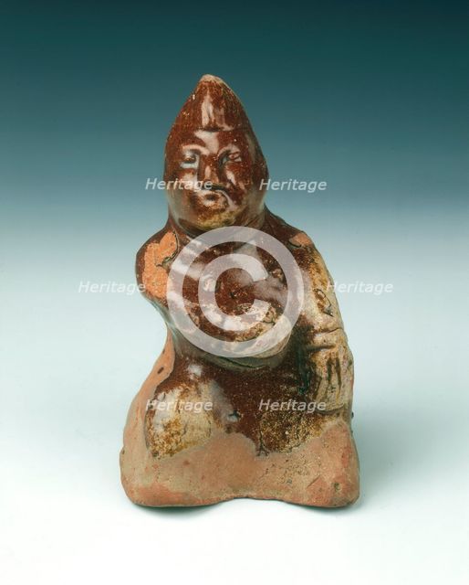 Brown lead glaze pottery dwarf, Eastern Han/Western Jin dynasty, China, 2nd-3rd century. Creator: Unknown.