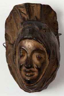 Brown painted plaster cast of cloaked head, c1850. Creator: Unknown