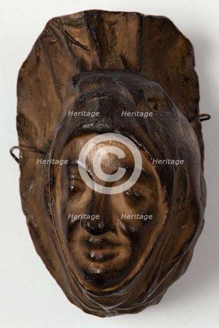 Brown painted plaster cast of cloaked head, c1850. Creator: Unknown.