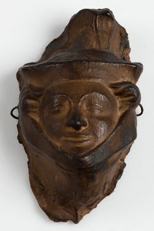 Brown painted plaster cast of head with head-dress, c1850. Creator: Unknown
