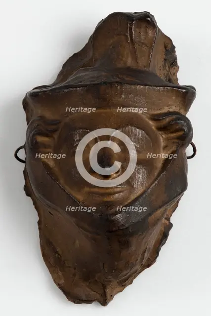 Brown painted plaster cast of head with head-dress, c1850. Creator: Unknown.