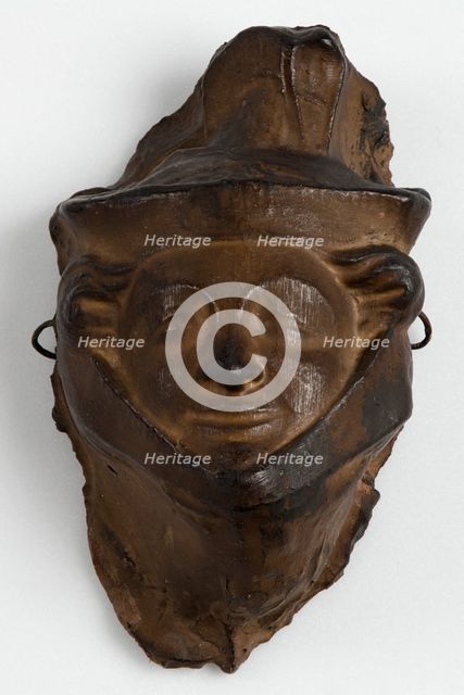 Brown painted plaster cast of head with head-dress, c1850. Creator: Unknown.