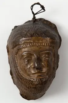 Brown painted plaster cast of male figure in armour or chain mail, c1850. Creator: Unknown