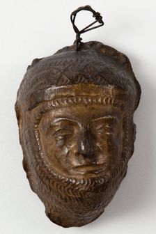 Brown painted plaster cast of male figure in armour or chain mail, c1850. Creator: Unknown