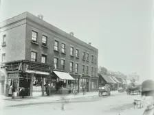 Butcher's and other shops on the Tower Bridge Road, Bermondsey, London, 1900