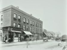 Butcher's and other shops on the Tower Bridge Road, Bermondsey, London, 1900