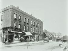 Butcher's and other shops on the Tower Bridge Road, Bermondsey, London, 1900