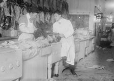 Butchers idle at meat counter during meat boycott, 1910. Creator: Bain News Service