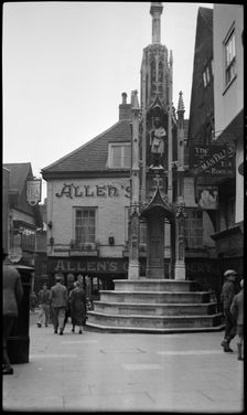 Butter Cross, High Street, Winchester, Hampshire, 1940-1949. Creator: Ethel Booty