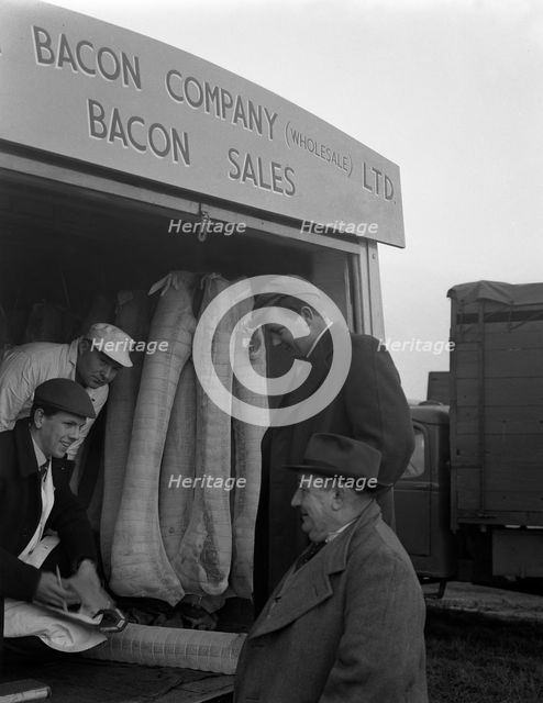 Buying wholesale meat from a Danish Bacon Company lorry, Barnsley, South Yorkshire, 1961. Artist: Michael Walters