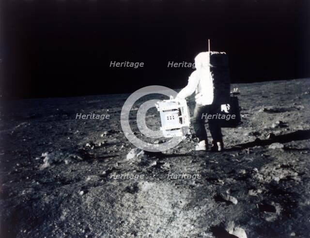Buzz Aldrin carries out an experiment on the lunar surface, Apollo II mission, July 1969. Creator: Neil Armstrong.