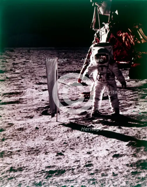 Buzz Aldrin deploys solar wind collector on the surface of the Moon, Apollo 11 mission, July 1969.  Creator: Neil Armstrong.