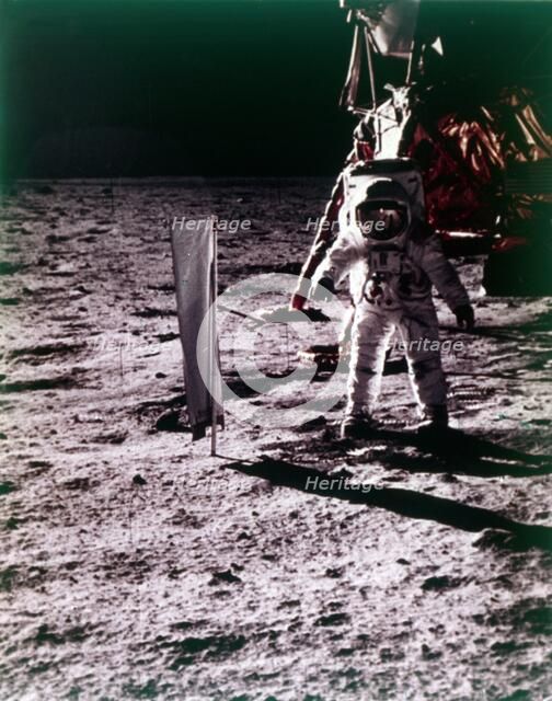 Buzz Aldrin deploys solar wind collector on the surface of the Moon, Apollo 11 mission, July 1969.  Creator: Neil Armstrong.