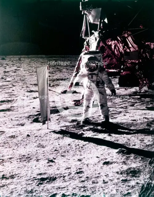 Buzz Aldrin deploys solar wind collector on the surface of the Moon, Apollo 11 mission, July 1969.  Creator: Neil Armstrong.